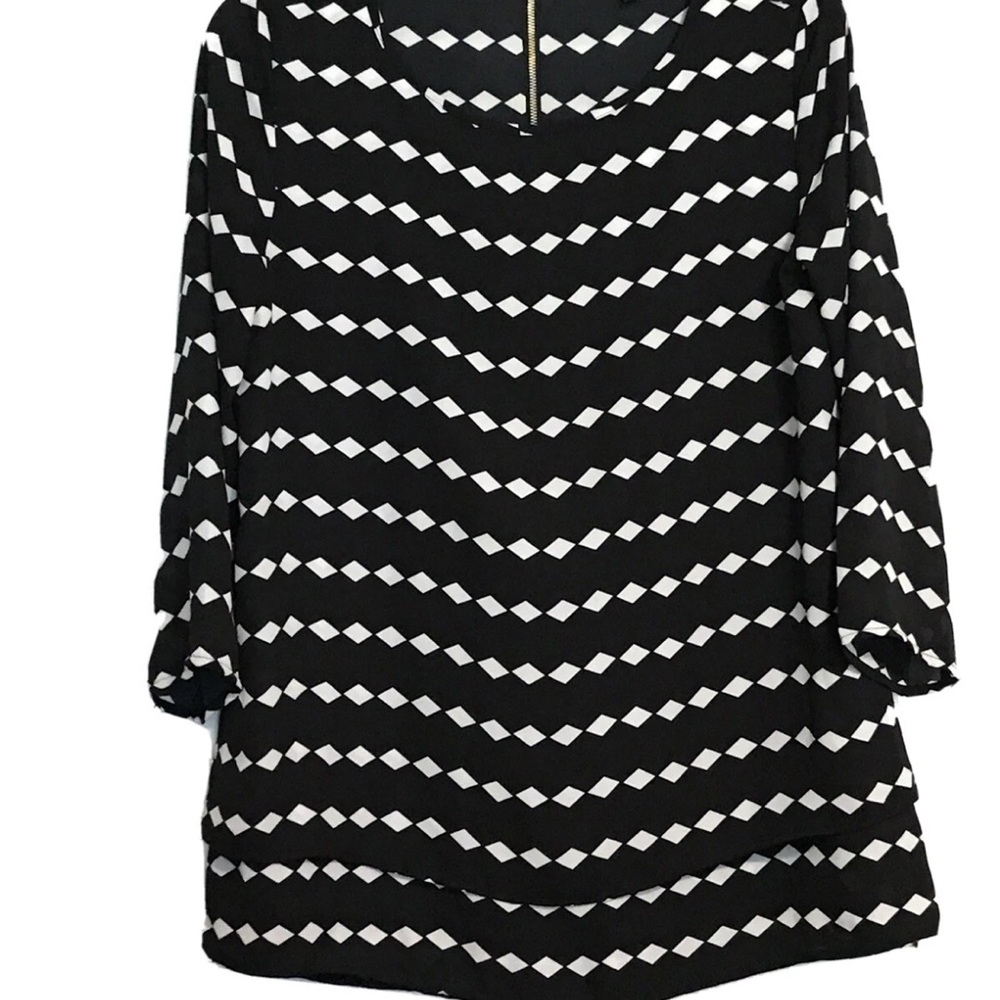 The Limited Black and White Geometric Tunic